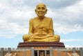 The Great Golden statue Monk at Puttha Utthayan Maharat Buddha Park Royalty Free Stock Photo