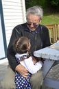 Great Granddad hug his great grandchild