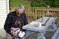 Great Granddad hug his great grandchild