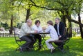 Great-grandfather, grandfather, father and son wrestling