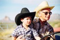 Great Grandfather and Grandson on Tractor