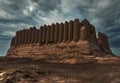 Great Gyz Gala maidens castle in an overcast day with stormy clouds howeviring above the fortress, located in Mary, Turkmenista Royalty Free Stock Photo