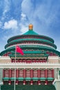 The five-star red flag on the flagpole in front of the Great Hall of the People in Chongqing flies Royalty Free Stock Photo