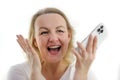 great happiness success joy close-up face of a woman laughing sincerely open her mouth looks to the side holds the phone Royalty Free Stock Photo