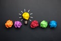 Great idea concept with crumpled colorful paper and light bulb