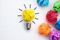 Great idea concept with crumpled colorful paper and light bulb