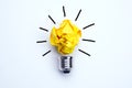 Great idea concept with crumpled yellow paper light bulb