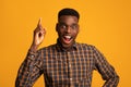 Great Idea. Excited African Guy Pointing Finger Up And Looking At Camera Royalty Free Stock Photo