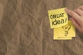 Great idea words crumpled sticky note paper on texture paper Royalty Free Stock Photo