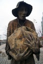 Oner male figure in Great Irish Famine bronze statue set