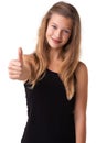 Great job. Cropped view of a pretty young teen girl giving a thumbs up. Royalty Free Stock Photo