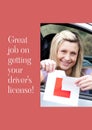 Great job on getting your driving license text over happy caucasian woman in car tearing l plate Royalty Free Stock Photo
