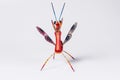 Mexican red mantis alebrije in white background in front view Royalty Free Stock Photo