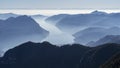 Great landscape at lake Iseo in winter season. Foggy and humidity in the air. Panorama from Monte Pora, Italian Alps, Italy Royalty Free Stock Photo