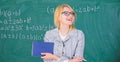 Great letter of recommendation. Woman smiling teacher hold book stand front chalkboard. Recommendation tips application