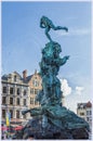 The Great Market Square in Antwerp, Belgium with the Cathedral, belfry, guildhouses and the statue of Brabo