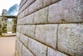 Great masonry of old inca wall in Machu Picchu ancient city in Peru Royalty Free Stock Photo