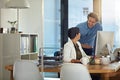 Great minds at work. businesspeople working on a computer in an office.