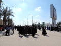 People walking towards the Great Mosque of Kufa, Najaf, Iraq Royalty Free Stock Photo