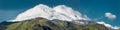 Mount Elbrus in the clouds, panoramic view. National Park, North Caucasus, Russia