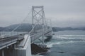 Great Naruto Bridge with gray sky background in cloudy day at Tokushima