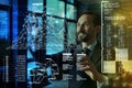 Clever programmer standing in front of his device and touching the screen