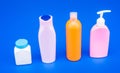 Great for packaging. Bottles for beauty products. Plastic bottles and jar blue background. HDPE
