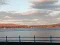 Great pic of across water angry clouddband calm sea Royalty Free Stock Photo