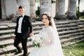 Great portrait of a wedding couple near the old castle