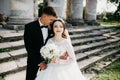 Great portrait of a wedding couple near the old castle