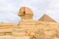 The great pyramid of Cheops and Sphinx in Giza plateau. Cairo, Egypt Royalty Free Stock Photo