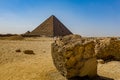 Great pyramid of Cheops and Sphinx in Giza plateau. Royalty Free Stock Photo