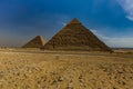 Great pyramid of Cheops and Sphinx in Giza plateau. Royalty Free Stock Photo