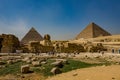 Great pyramid of Cheops and Sphinx in Giza plateau. Royalty Free Stock Photo