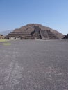 Great pyramid of the Moon at Teotihuacan ruins seen from Avenue of the Dead near Mexico city landscape - vertical