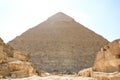 Great pyramid of Pharaoh Khafre, and the ruins of the architectural complex of Giza, Cairo surroundings Royalty Free Stock Photo
