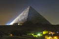 Great Pyramid of Giza illuminated at night, UNESCO World Heritage site, Cairo, Egypt.