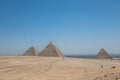 The Great Pyramids of Giza near the ruins of a temple in Giza, Egypt Royalty Free Stock Photo