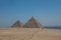 The Great Pyramids of Giza near the ruins of a temple in Giza, Egypt Royalty Free Stock Photo