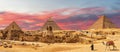 Great Pyramids of Giza and the Sphinx, bedouin with a camel, beautiful panorama of Cairo region, Egypt Royalty Free Stock Photo