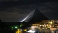 Great pyramids of Giza with sphinx light show view from rooftop at night Royalty Free Stock Photo