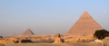 The Great Pyramids of Giza and Sphinx at sunrise Royalty Free Stock Photo