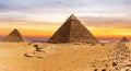 The Great Pyramids and the sunset in Giza, Cairo, Egypt Royalty Free Stock Photo