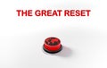 The Great Reset text, red push button with illustration of the world on it, economic reset concept