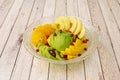 Great salad with first-rate ingredients in great quantity. Apple, chopped orange, kiwi and mango, peeled apple