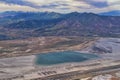 Great Salt Lake Utah Aerial view from airplane looking toward Oquirrh Mountains and Antelope Island, Tooele, Magna, with sweeping