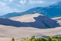 Great Sand Dunes National Park, Colorado, USA. Beautiful scenic majestic sand dunes and mountain peaks. Travel destination locatio