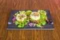 great scallop tartare with crunchy onion, ripe Mexican avocado and sprouts of lettuce Royalty Free Stock Photo