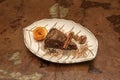 great serving of carrot cake with cloves and cinnamon, chopped California nuts and cocoa powder