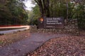 Great Smoky Mountains Entry Sign with Car Lights Royalty Free Stock Photo